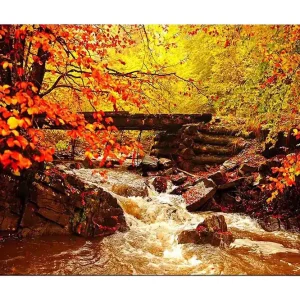 Canvastavla 70x100 cm - Vacker höstscen med en porlande bäck omgiven av färgglada träd och löv i varma nyanser Orange / Gult / Brunt - Inredning Populär