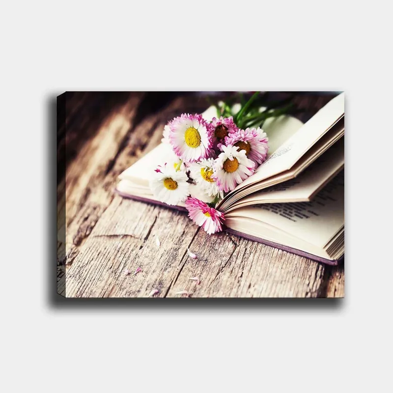 Canvastavla 70x100 cm - Bukett med blommor placerad på en öppen bok Vit / Rosa / Gul - Inredning Endast idag