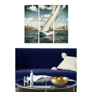 Canvastavla i trä 3-delar 50x70 cm - Segelbåt som navigerar genom vågorna i en stadsmiljö Blå / Vit / Beige - Inredning Erbjudandepris