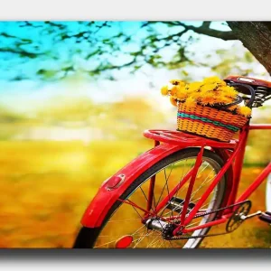 Canvastavla 70x100 cm - Röd cykel med en korg fylld av gula blommor Röd / Gul / Grön - Inredning Snabb leverans