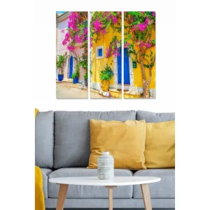 Beställ idag Canvastavla i trä 3-delar 50x70 cm - Färgglad fasad med bougainvillea och blå dörr Rosa / Gul / Blå - Inredning