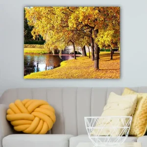 Canvastavla 70x100 cm - Vacker höstscen med gyllene träd som speglar sig i en stilla sjö Guld / Grön / Brun - Inredning Begränsad tid