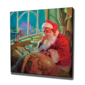 Canvastavla 45x45 cm - Reflekterande jultomte vid ett skrivbord med en glob och papper Röd / Grön / Beige - Inredning Begränsat antal