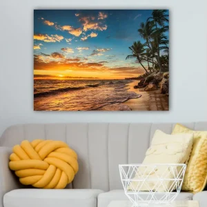 Rabatt Canvastavla 70x100 cm - Vacker solnedgång vid en strand med palmer och mjuka vågor som rullar in mot sanden Orange / Blå / Beige - Inredning