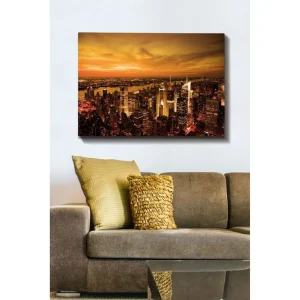 Snabb frakt Canvastavla 70x100 cm - Panoramavy av en stad vid solnedgång med höga byggnader och en dramatisk himmel Orange / Guld / Svart - Inredning