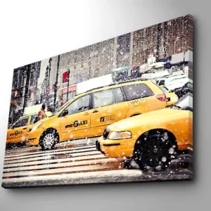 Kampanjpris Canvastavla 70x100 cm - Livlig stadsbild med gula taxibilar som kör genom snöfall i New York City Gul / Svart - Inredning