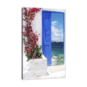 Outlet Canvastavla 70x100 cm - Vacker blå dörr omgiven av blommor i rött som leder ut mot en havsutsikt Blå / Röd / Grön - Inredning