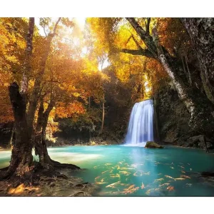 Canvastavla 70x100 cm - Vacker höstscen med ett vattenfall omgiven av färgglada träd och klart vatten Guldorange / Turkos / Brun - Inredning Beställ idag