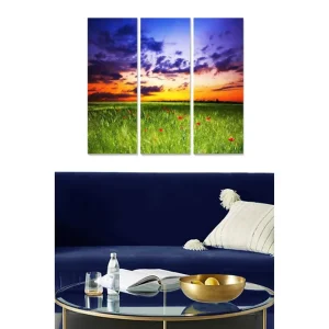 Canvastavla i trä 3-delar 50x70 cm - Vacker solnedgång över en grön äng med röda blommor Grön / Orange / Blå - Inredning Billig