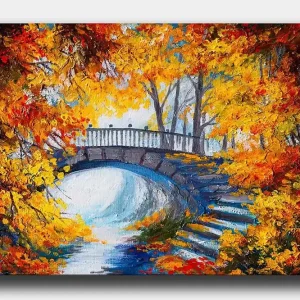 Canvastavla 70x100 cm - Vacker bro omgiven av höstfärgade träd och löv Orange / Gult / Blått - Inredning Kampanj