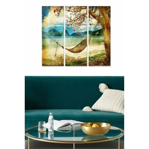 Canvastavla i trä 3-delar 50x70 cm - Avkopplande hängmatta under ett träd vid en strand med berg i bakgrunden Blå / Grön / Beige - Inredning risnedsättning