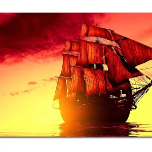 Canvastavla 70x100 cm - Ett majestätiskt segelfartyg med röda segel som navigerar genom en gyllene solnedgång Röd / Orange / Gul - Inredning Erbjudandepris