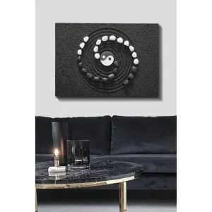 Rabatter Canvastavla 70x100 cm - Stiliserad yin-yang-symbol omgiven av svarta och vita stenar i en spiralformad komposition Svart / Vit - Inredning