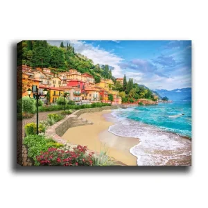 Canvastavla 70x100 cm - Vacker kustlinje med färgglada hus som klättrar uppför en grönskande kulle vid en strand Blå / Grön / Gul - Inredning Beställ nu